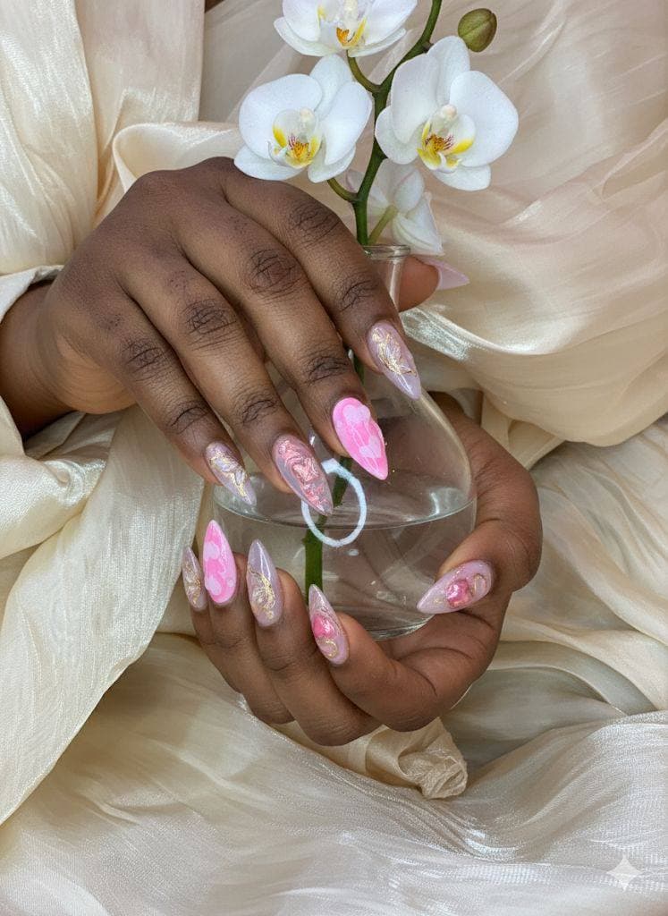 Premium pink and gold marble nail art with white orchid